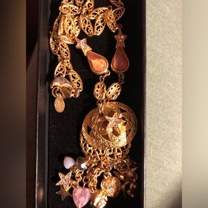 Enchanting Kirks Folly necklace with jewels and moon. Gold tone, 32” chain.